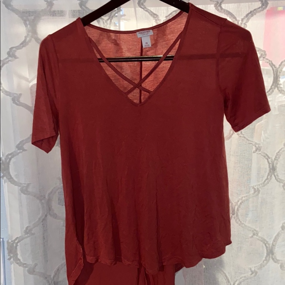 Cross Cross front with high low detail.